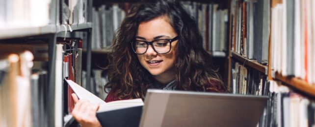 female student in library