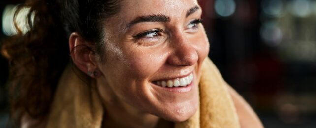 Woman Smiles After Workout